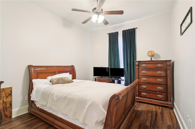 bedroom with dark wood-type flooring and ceiling fan