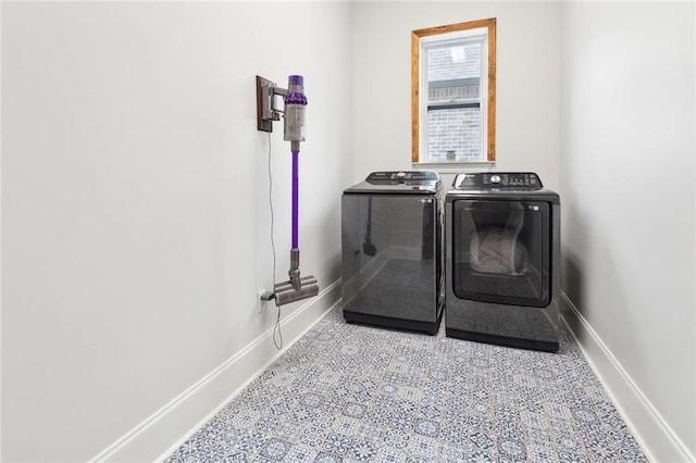 washroom featuring independent washer and dryer