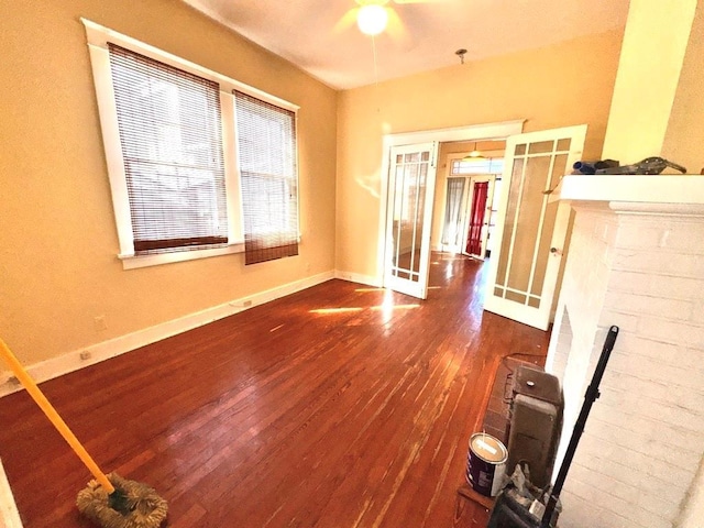 spare room with french doors and wood-type flooring