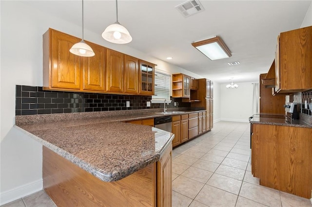 kitchen with sink, light tile patterned floors, hanging light fixtures, backsplash, and kitchen peninsula