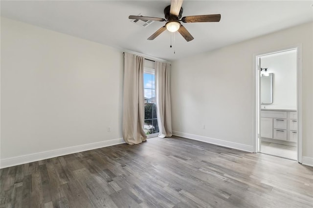 unfurnished room featuring wood-type flooring and ceiling fan