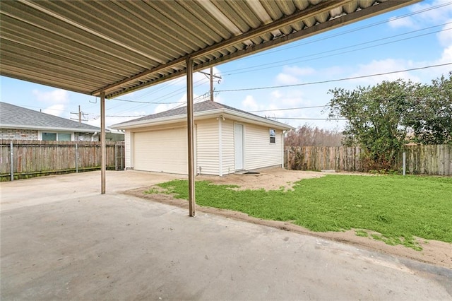 garage featuring a yard