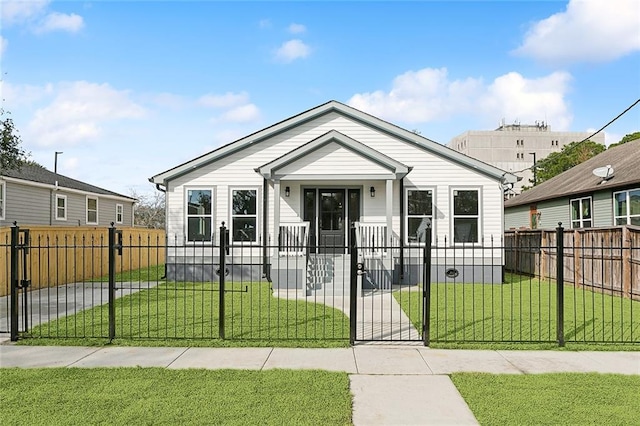 bungalow-style house with a front yard