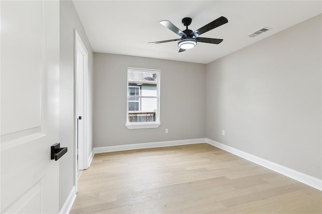 unfurnished room with light hardwood / wood-style floors and ceiling fan