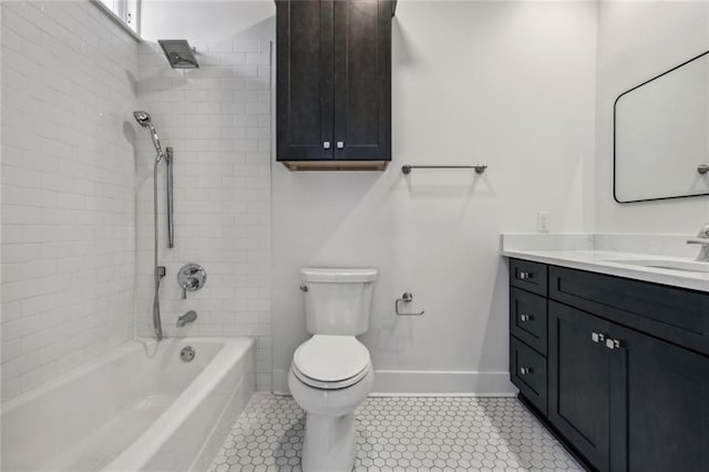 full bathroom with tile patterned flooring, vanity, toilet, and tiled shower / bath