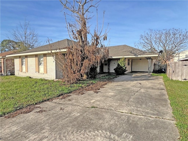 ranch-style house with a front lawn and a carport