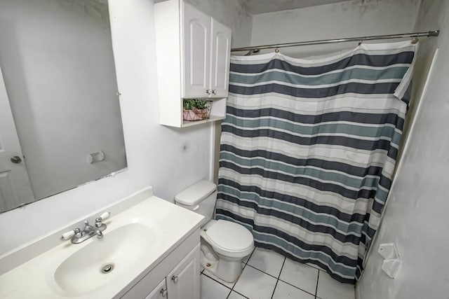 bathroom featuring tile patterned floors, vanity, toilet, and a shower with shower curtain