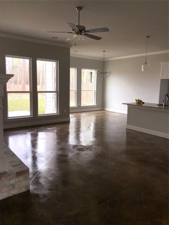 unfurnished living room with crown molding and ceiling fan