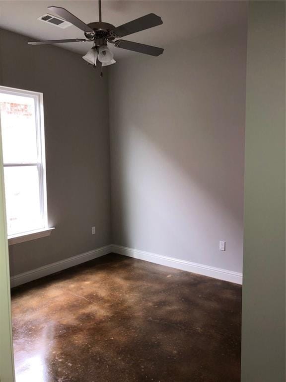 spare room featuring ceiling fan