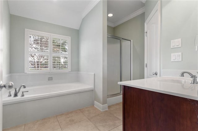 bathroom with vanity, separate shower and tub, ornamental molding, and tile patterned floors