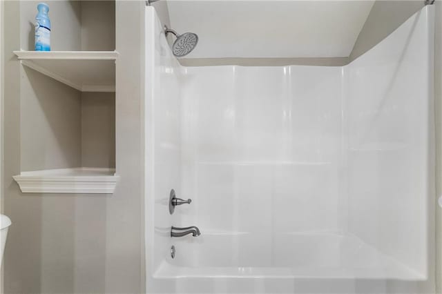 bathroom with shower / bathtub combination