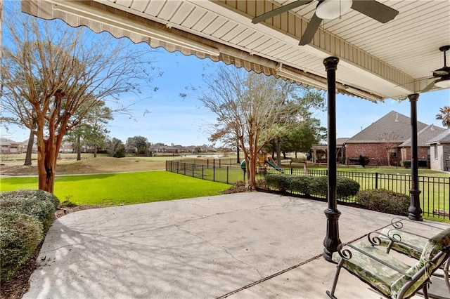 view of patio featuring ceiling fan