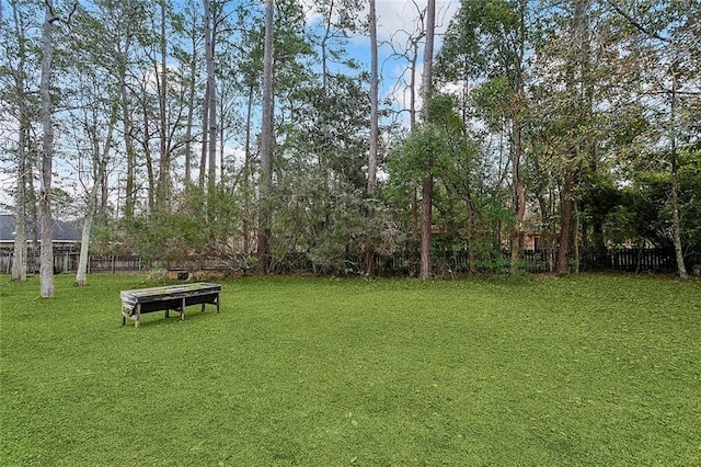 view of yard with fence