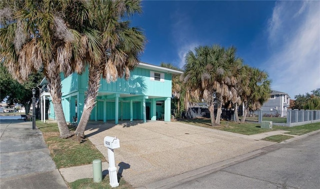 beach home featuring a carport