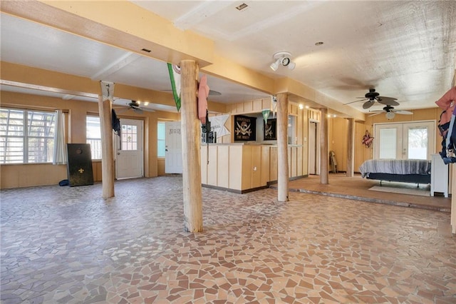 basement featuring ceiling fan