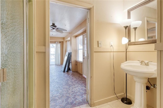 bathroom featuring sink and ceiling fan