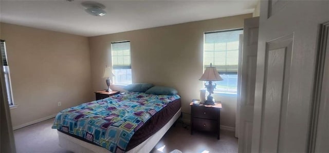 bedroom with multiple windows