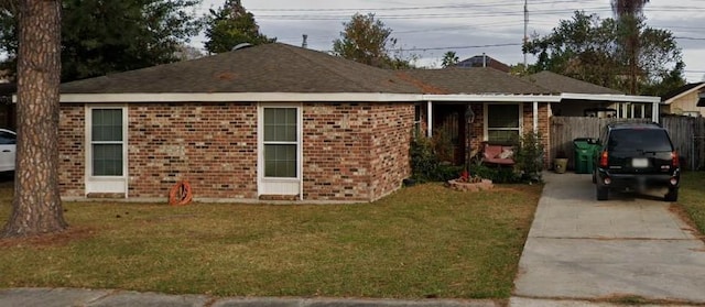 ranch-style home with a front lawn