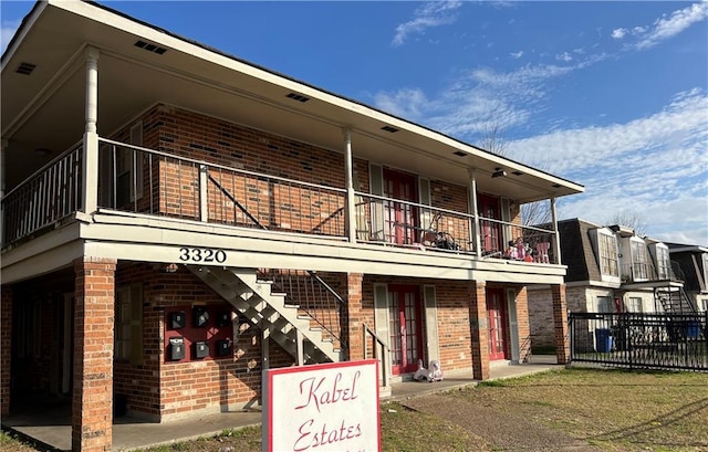 332022 Kabel Dr, New Orleans, LA 70131 - view of property featuring stairs
