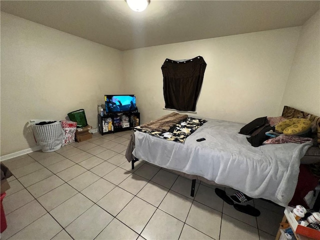 332022 Kabel Dr, New Orleans, LA 70131 - bedroom with light tile patterned floors and baseboards