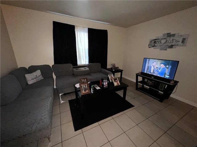 332022 Kabel Dr, New Orleans, LA 70131 - living room featuring light tile patterned floors and baseboards