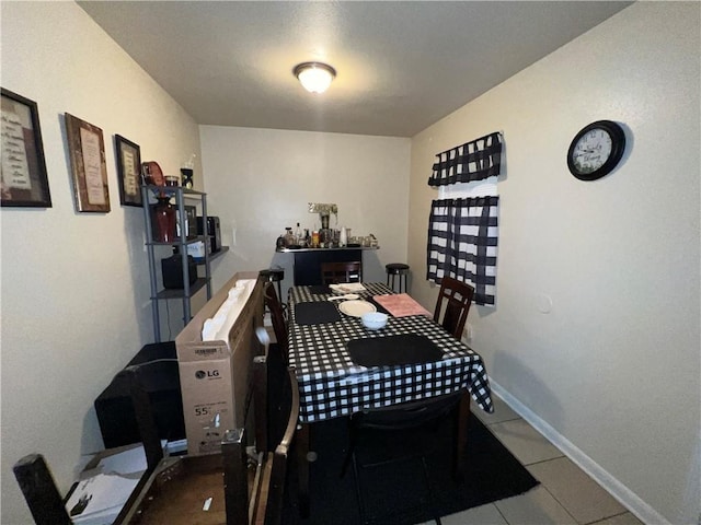 332022 Kabel Dr, New Orleans, LA 70131 - tiled dining space featuring baseboards