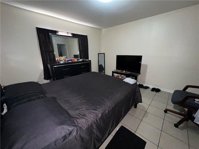 332022 Kabel Dr, New Orleans, LA 70131 - bedroom with light tile patterned floors and baseboards
