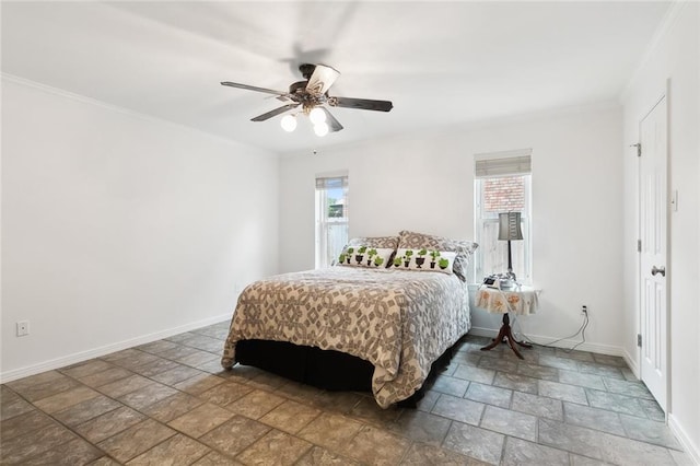 bedroom featuring ceiling fan, ornamental molding, and multiple windows