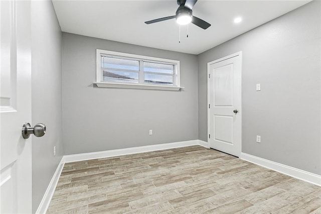 unfurnished room with light hardwood / wood-style floors and ceiling fan