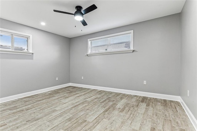 unfurnished room featuring ceiling fan and light hardwood / wood-style floors