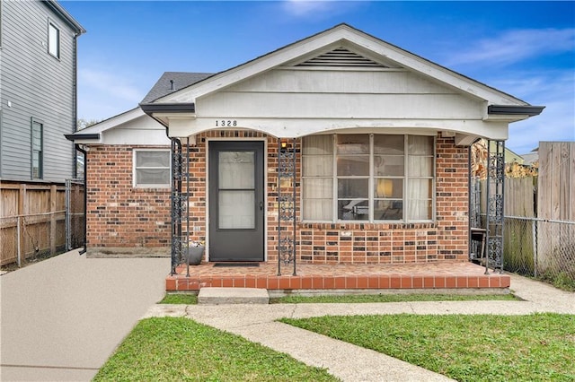 1328 Clouet St, New Orleans, LA 70117 - view of front of home featuring brick siding
