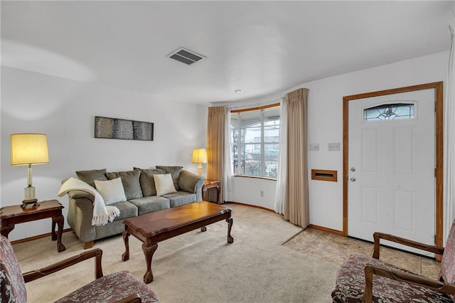 living room featuring light colored carpet