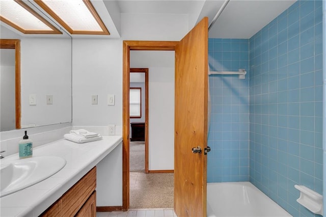 1328 Clouet St, New Orleans, LA 70117 - bathroom featuring vanity, shower / washtub combination, and baseboards