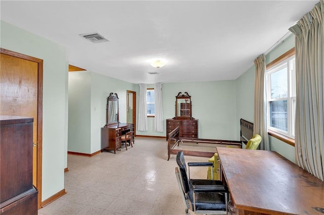 bedroom featuring multiple windows