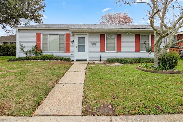 ranch-style house with a front yard