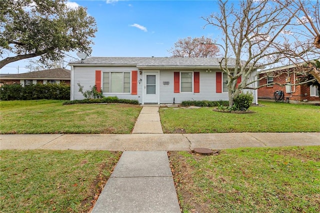 ranch-style house with a front lawn