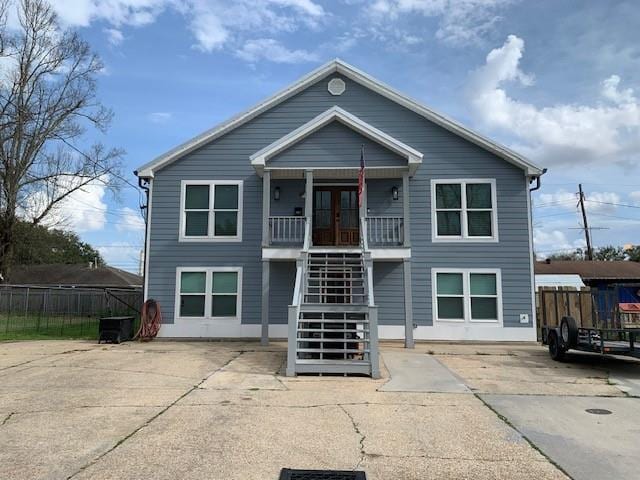 rear view of property with french doors