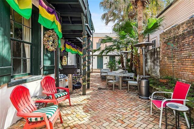 1224 Bourbon St Unit 1, New Orleans, LA 70116 - view of patio with outdoor dining area