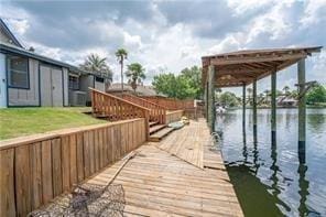 view of dock with a water view