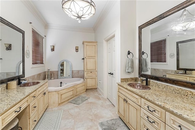 bathroom featuring crown molding, vanity, and a bathing tub