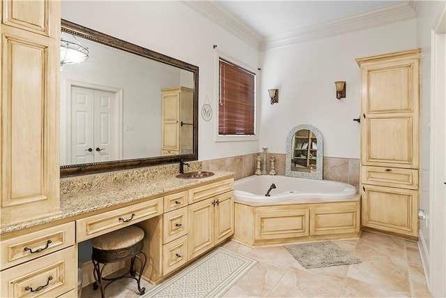 bathroom with crown molding, a bath, and vanity