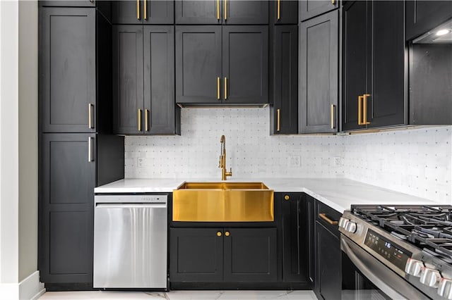 kitchen with ventilation hood, sink, decorative backsplash, stainless steel appliances, and light stone countertops