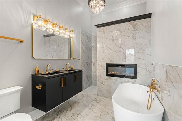 bathroom featuring tile walls, a bathtub, ornamental molding, vanity, and toilet