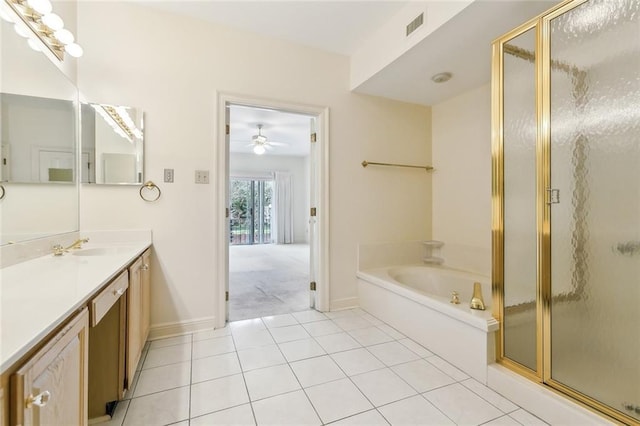 bathroom featuring tile patterned flooring, vanity, and independent shower and bath