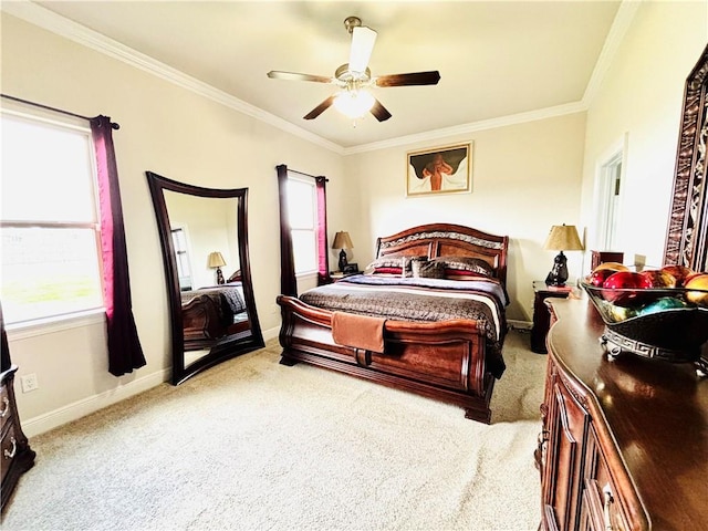 carpeted bedroom with multiple windows, crown molding, and ceiling fan