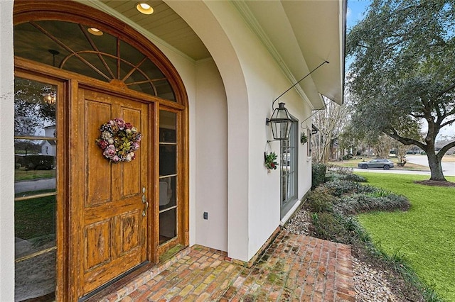 170 English Turn Dr, New Orleans, LA 70131 - doorway to property with a lawn