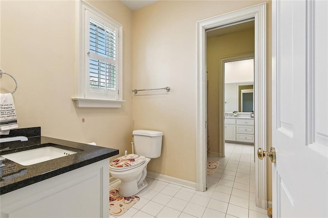 170 English Turn Dr, New Orleans, LA 70131 - bathroom with tile patterned flooring, vanity, and toilet