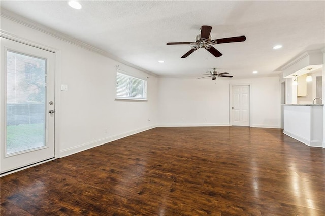 unfurnished living room featuring ornamental molding, dark hardwood / wood-style floors, and ceiling fan