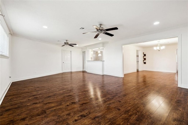 unfurnished living room featuring crown molding, ceiling fan with notable chandelier, and dark hardwood / wood-style floors