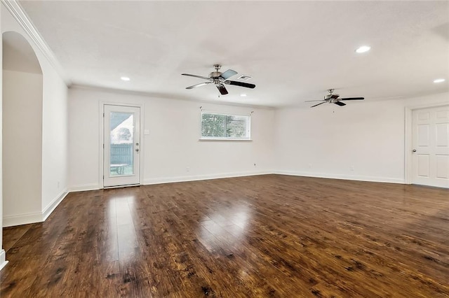 3512 James Dr, Metairie, LA 70003 - unfurnished living room with arched walkways, ceiling fan, recessed lighting, and dark wood-style floors